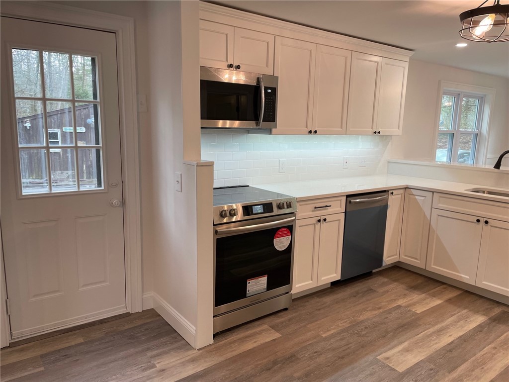 24 Pine Orchard Road Glocester, RI 02814 - Photo 4 of 12 Kitchen view at side door