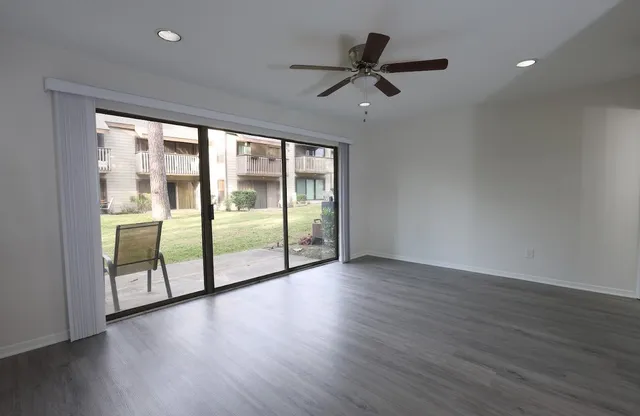 an aerial view of a house with swimming pool garden and patio