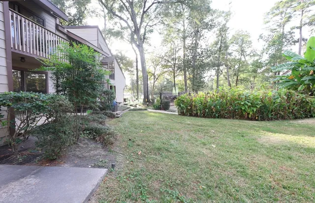 an aerial view of a house with swimming pool