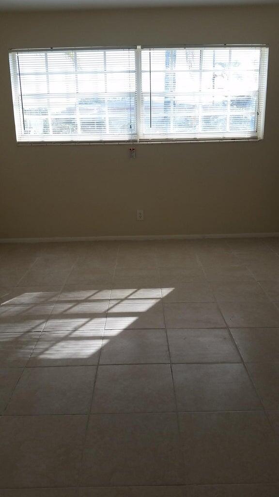 1230 West 23rd Street Riviera Beach, FL 33404 - Photo 18 of 19 a view of empty room with window