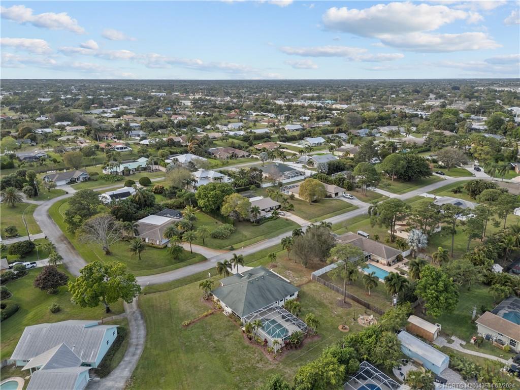 2457 Southeast Issac Road Port St. Lucie, FL 34952 - Photo 32 of 51 an aerial view of residential houses with city view