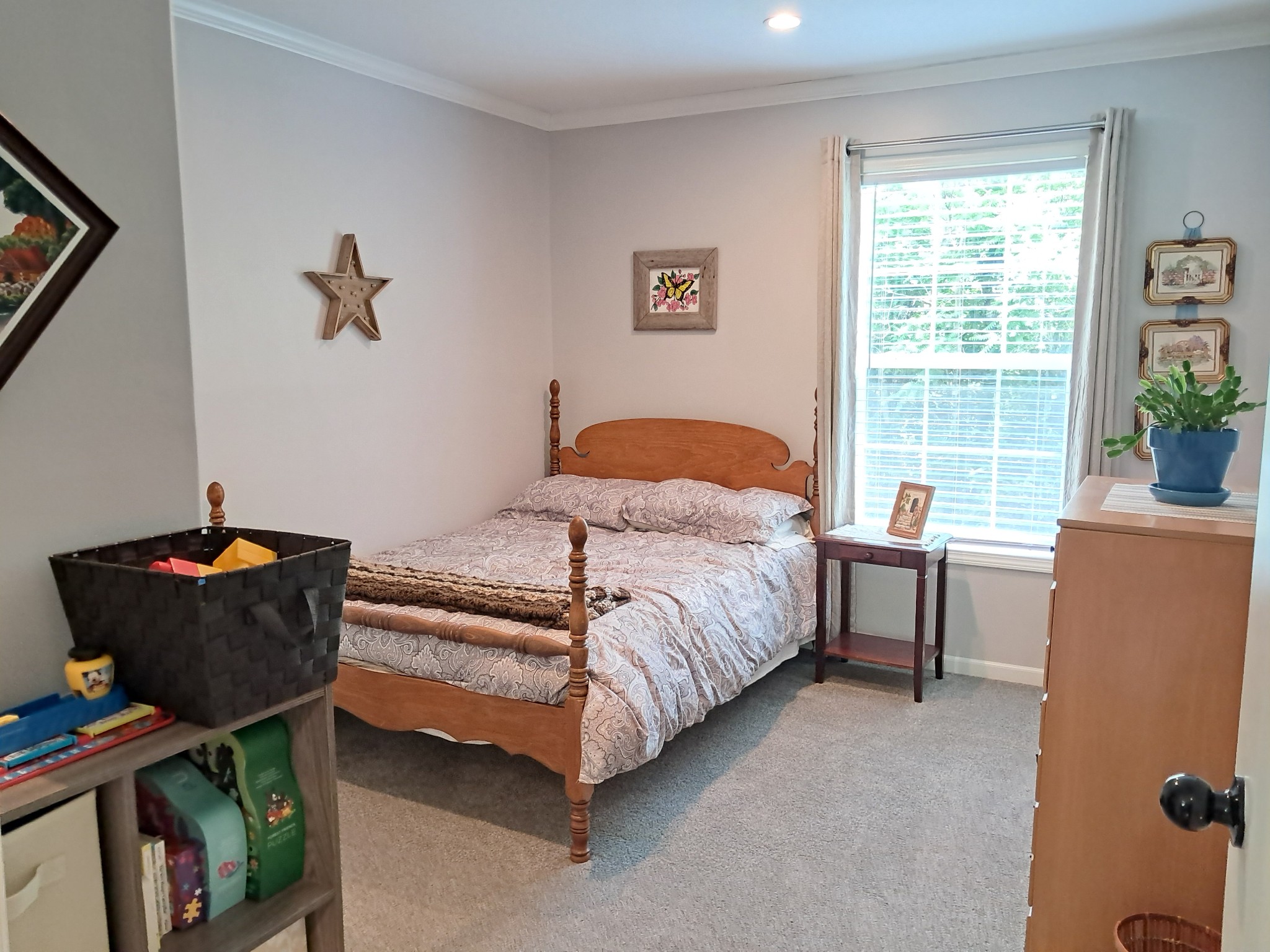 5525 Wiley Hollow Road Culleoka, TN 38451 - Photo 51 of 64 a bedroom with a bed and a window