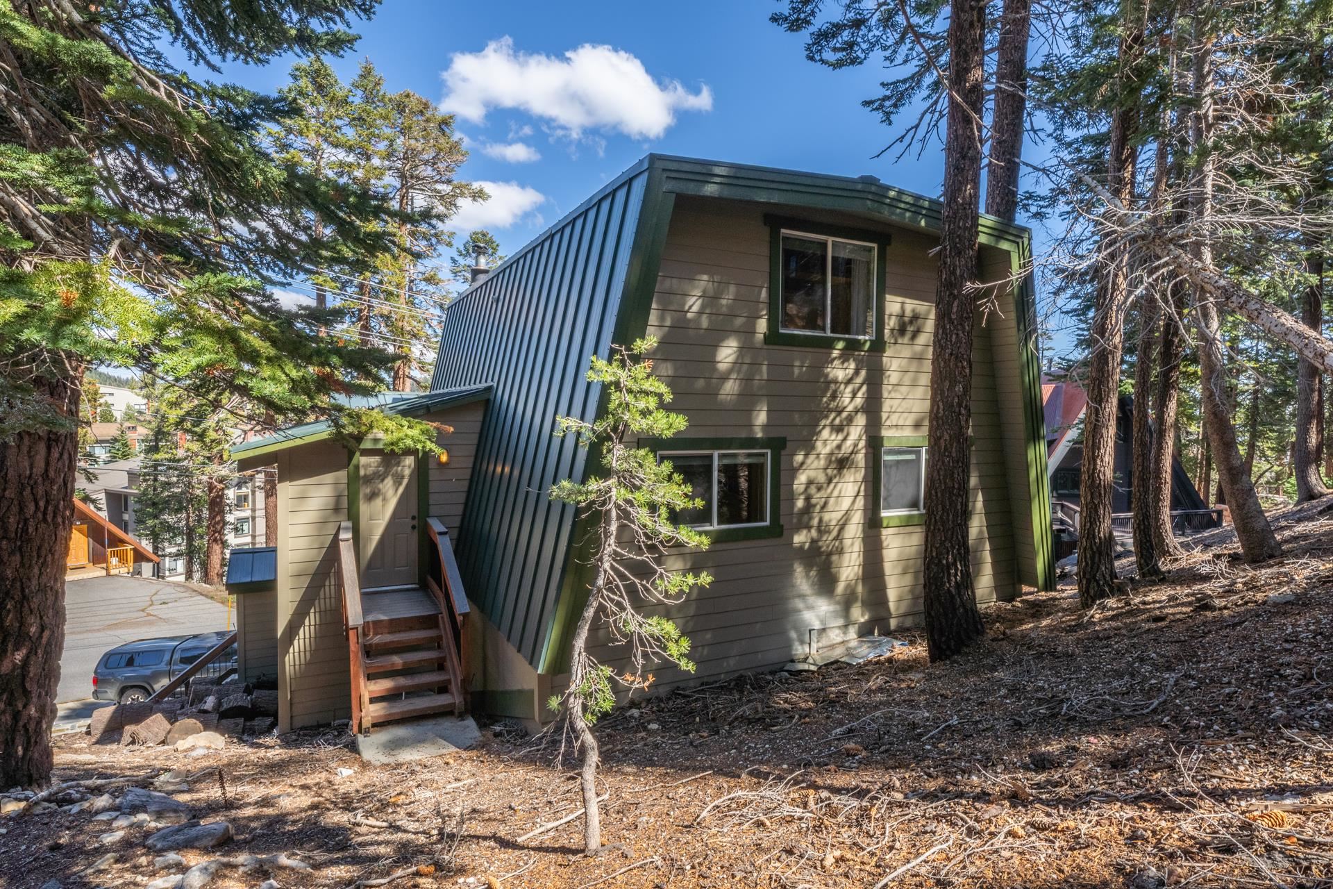 349 Davison Road Mammoth Lakes, CA 93546 - Photo 33 of 43 Back of property with a gambrel roof and a metal roof