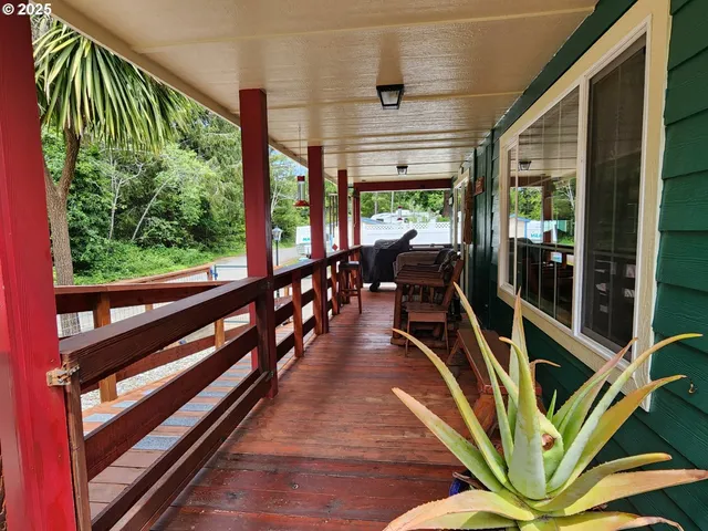 a view of a balcony with chairs