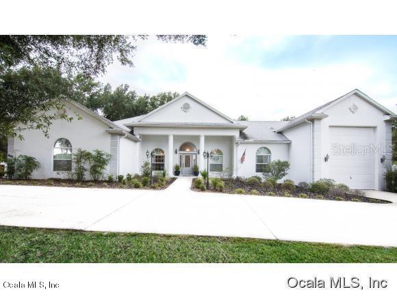 7662 Southwest 103rd Loop Ocala, FL 34476 - Photo 1 of 1 front