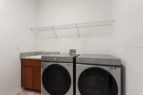 an empty room with a empty space and windows