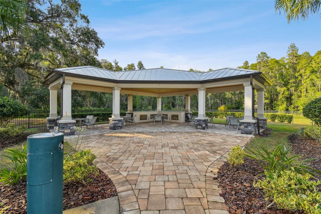 11127 Sundrift Drive Tampa, FL 33647 - Photo 44 of 44 a view of house with backyard and outdoor seating