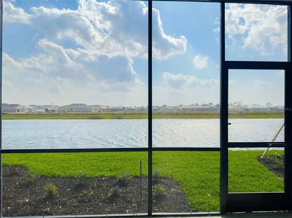 a view of a lake from a yard