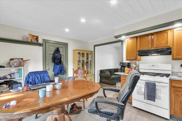 a view of a dining room with furniture window and outside view