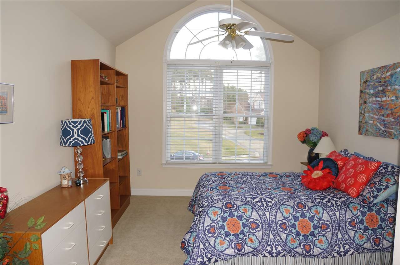 10913 Clovermill Circle Raleigh, NC 27617 - Photo 16 of 25 Cathedral ceiling in this room too, and it is attached to a great bathroom. Bedroom 3