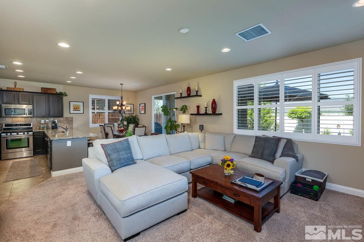 10701 Cordero Drive Reno, NV 89521 - Photo 2 of 25 a living room with furniture and a large window