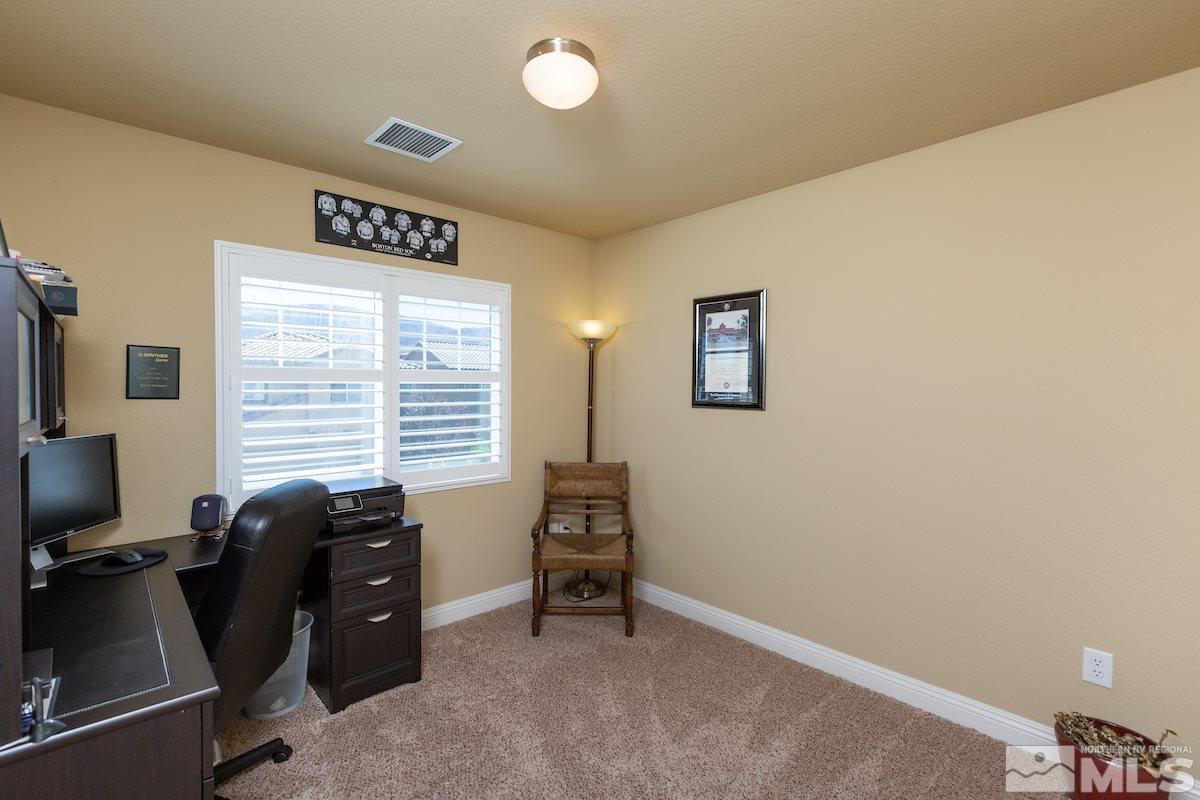 10701 Cordero Drive Reno, NV 89521 - Photo 21 of 25 a view of workspace with windows