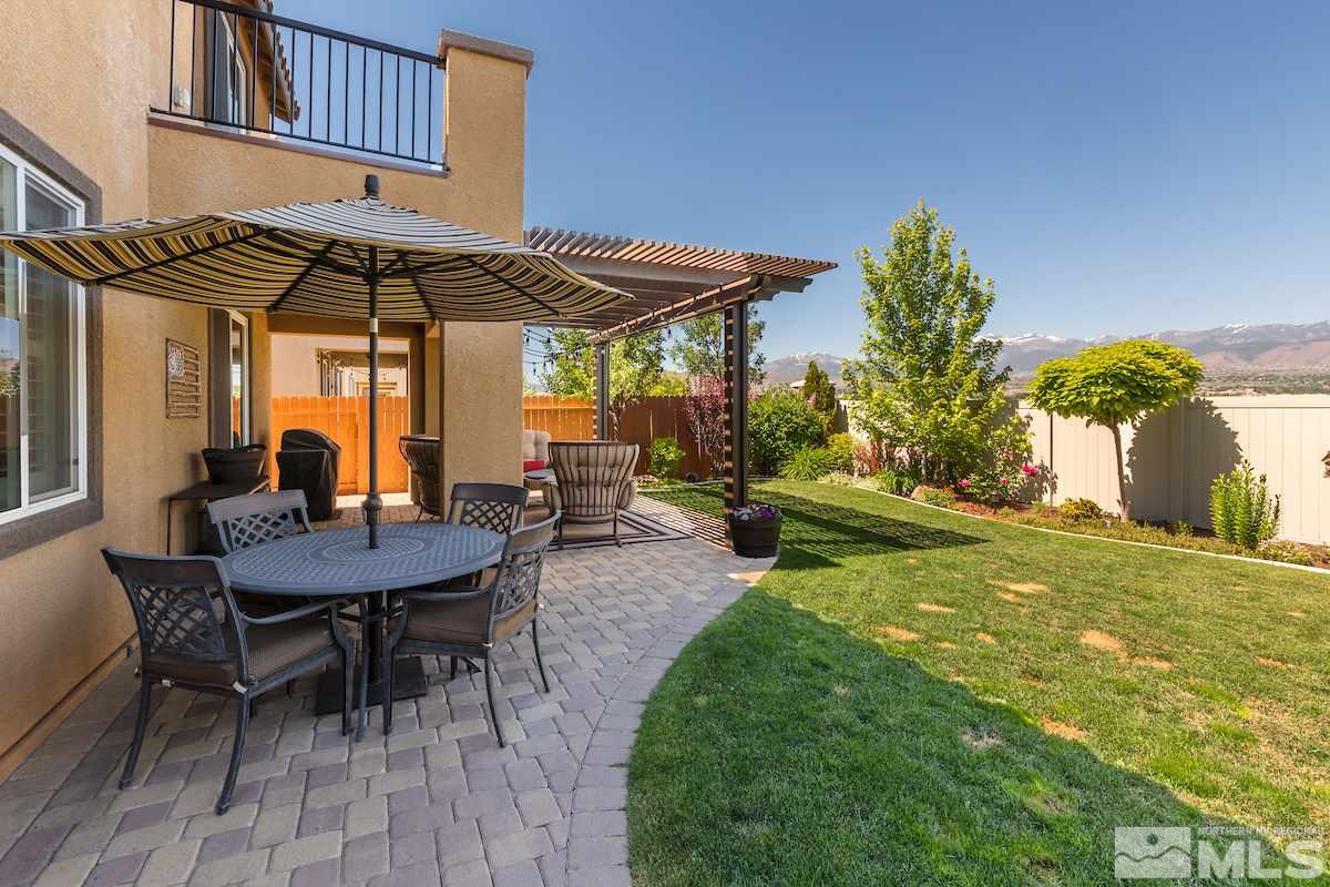 10701 Cordero Drive Reno, NV 89521 - Photo 23 of 25 a view of a table and chairs in patio