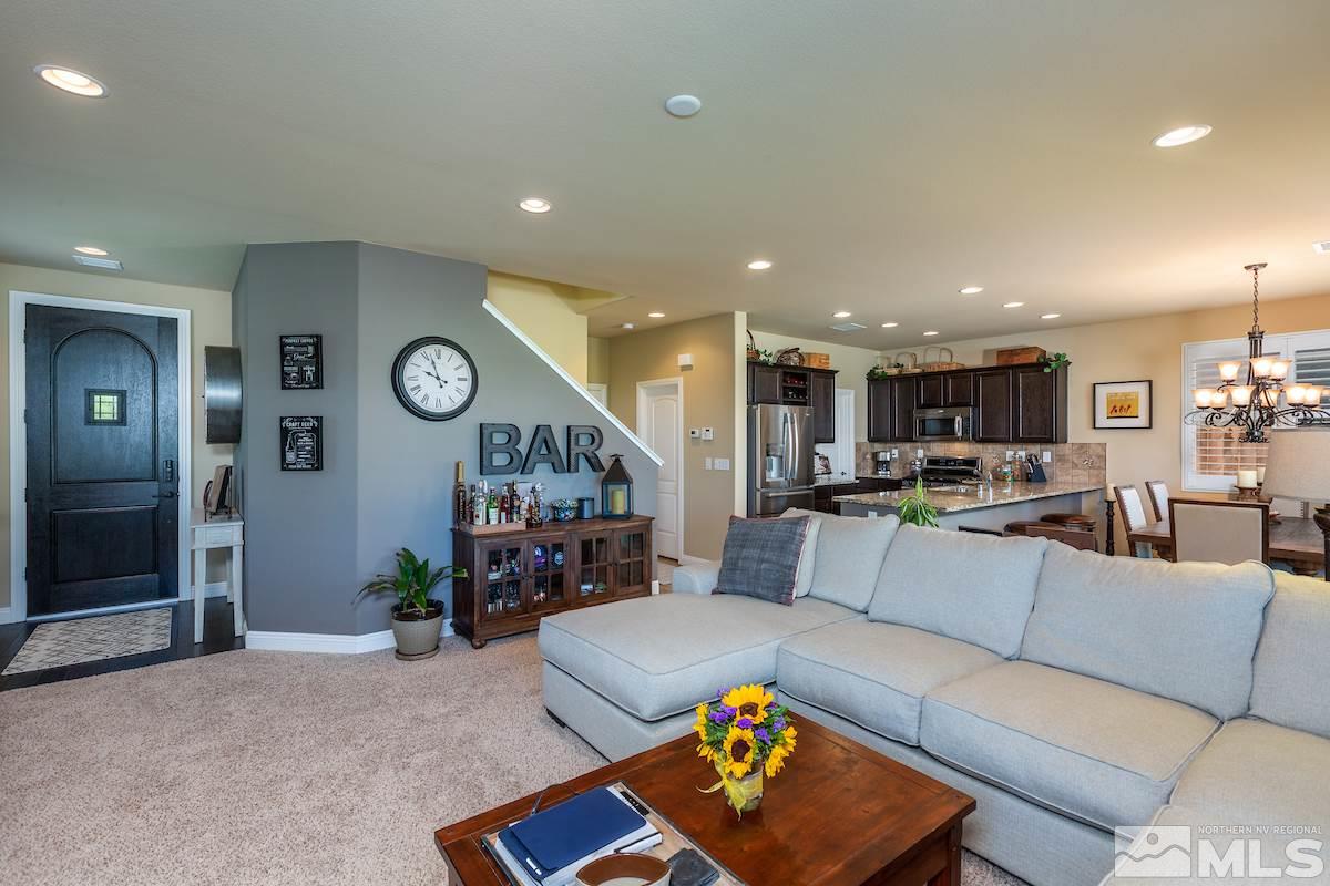 10701 Cordero Drive Reno, NV 89521 - Photo 3 of 25 a living room with furniture and kitchen view