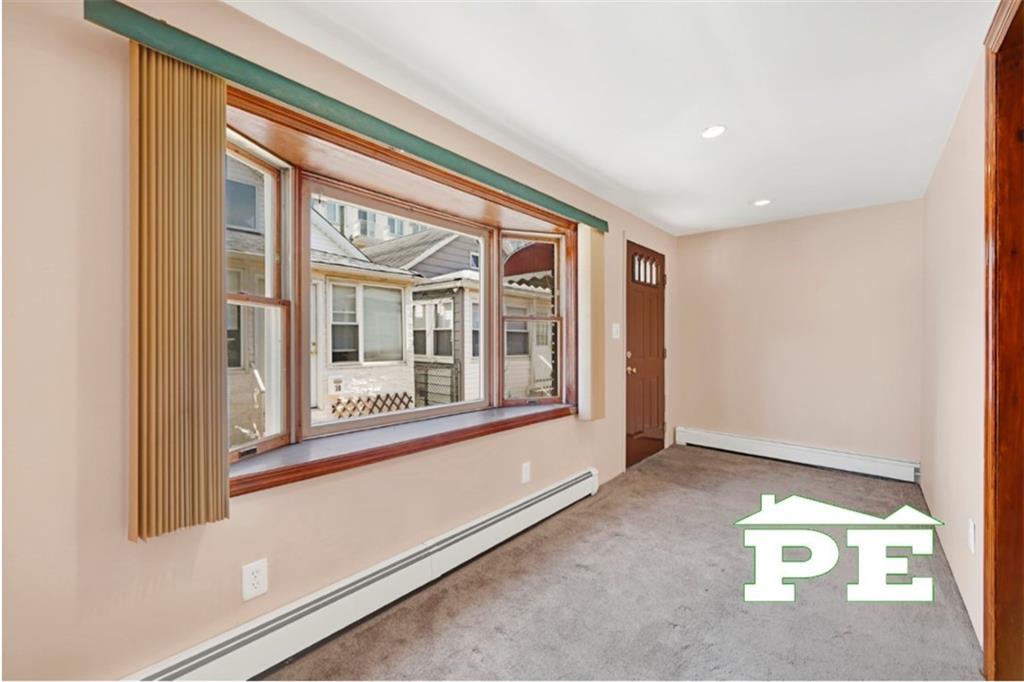 23 Bogardus Street Brooklyn, NY 11235 - Photo 11 of 21 a view of an empty room with a window