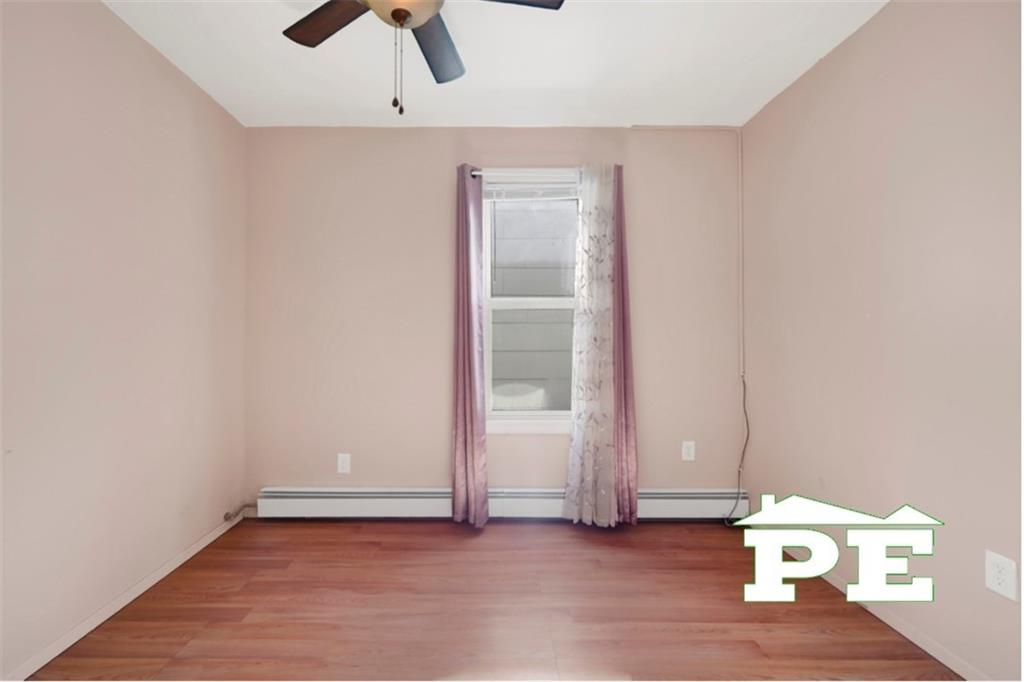 23 Bogardus Street Brooklyn, NY 11235 - Photo 14 of 21 wooden floor in an empty room