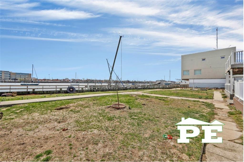 23 Bogardus Street Brooklyn, NY 11235 - Photo 18 of 21 a view of a swimming pool with a lawn chairs