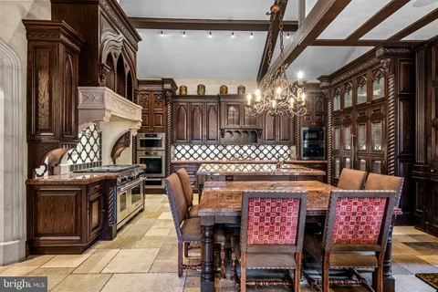 a view of a chairs and table in the patio