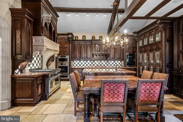 a view of a chairs and table in the patio