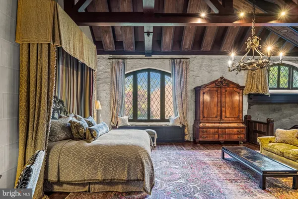 a outdoor living space with patio furniture and wooden floor