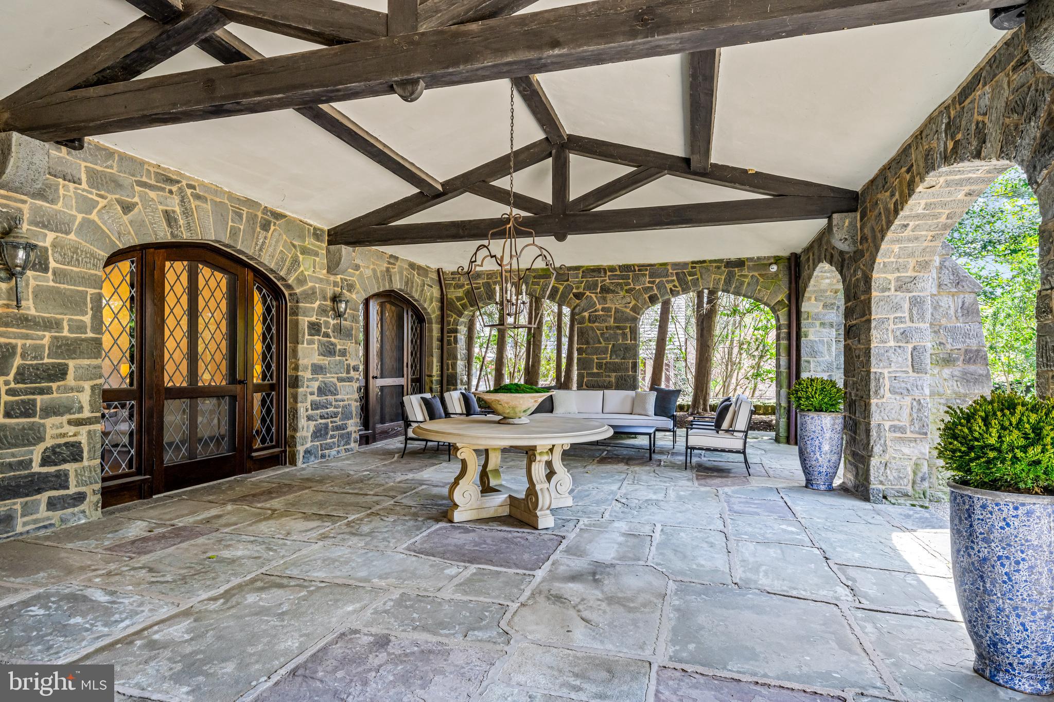 56 Crosby Brown Road Gladwyne, PA 19035 - Photo 3 of 51 a view of two chairs and table in a patio