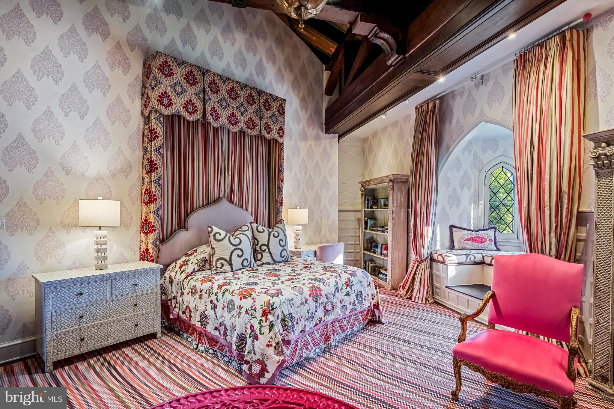 56 Crosby Brown Road Gladwyne, PA 19035 - Photo 34 of 51 a bedroom with a bed chair and a window