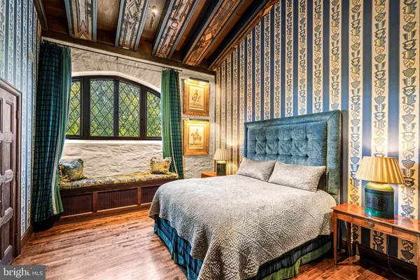 a bathroom with a sink a mirror and a shower