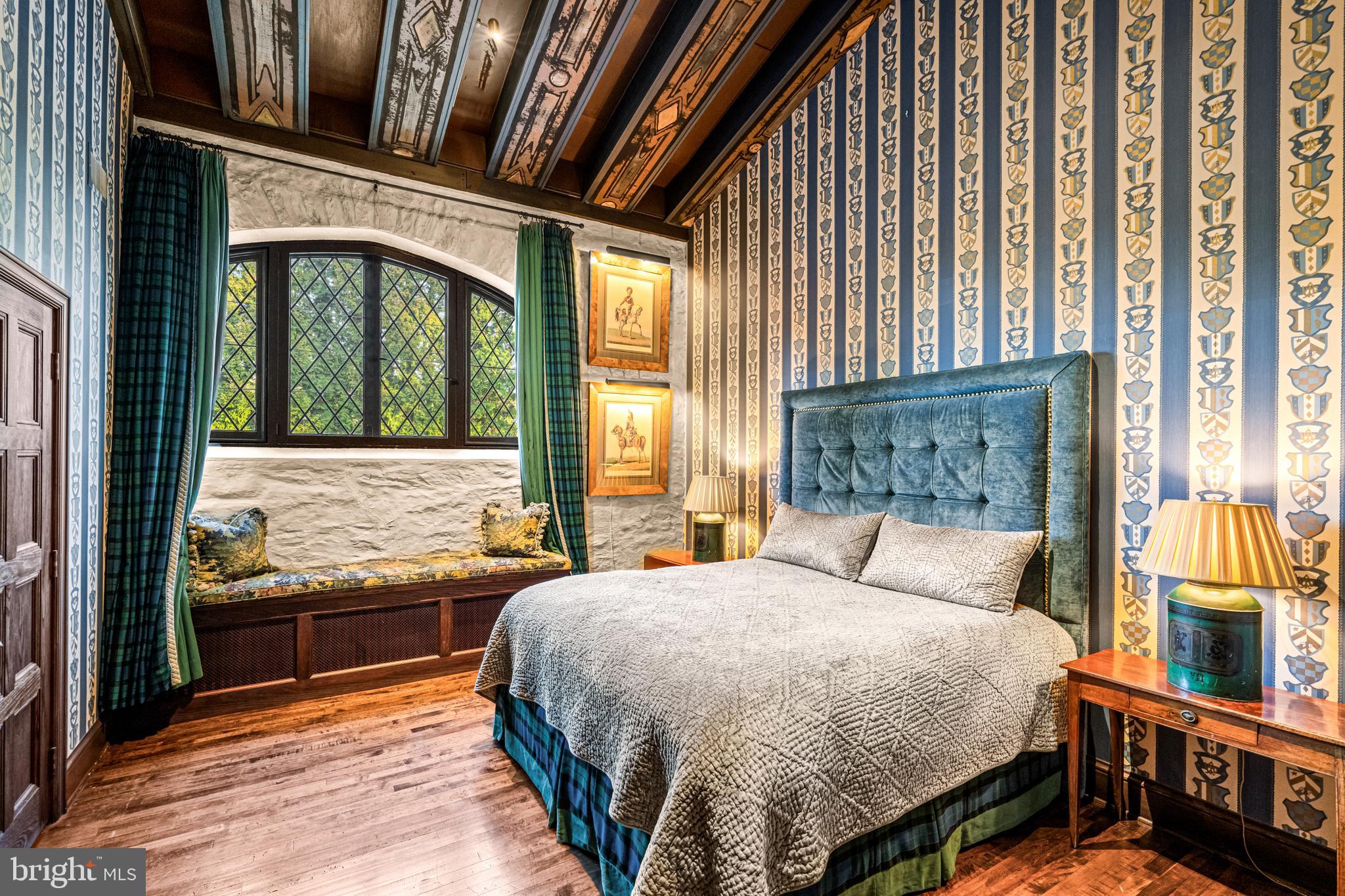 56 Crosby Brown Road Gladwyne, PA 19035 - Photo 36 of 51 a bedroom with a bed and wooden floor