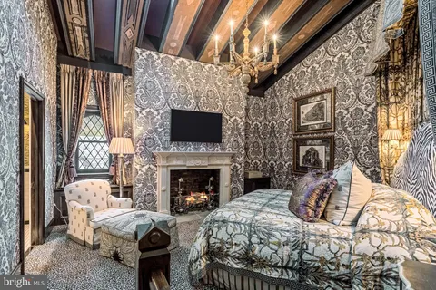 a bathroom with a toilet a sink and shower