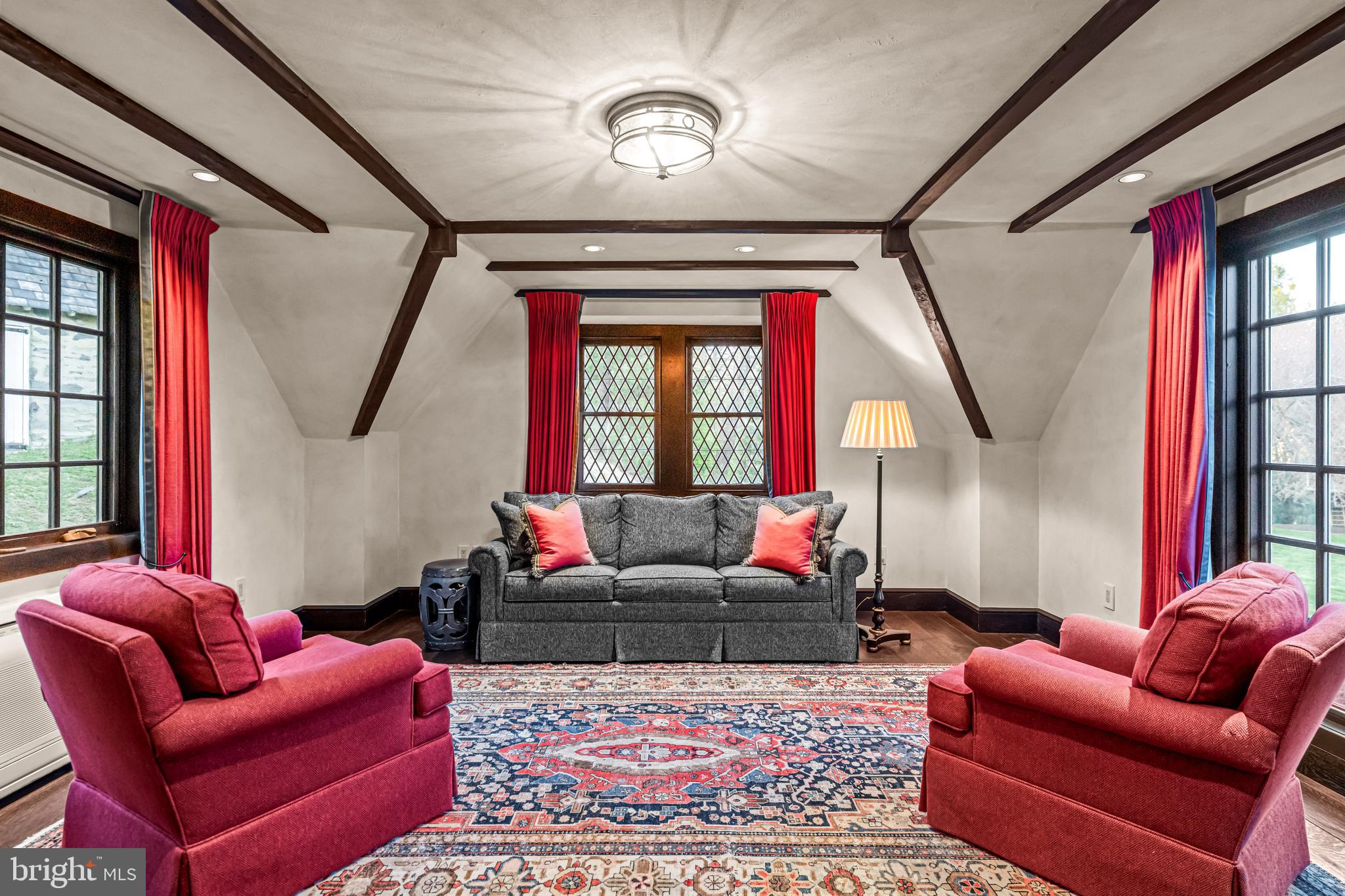 56 Crosby Brown Road Gladwyne, PA 19035 - Photo 43 of 51 a living room with furniture a couch and a window