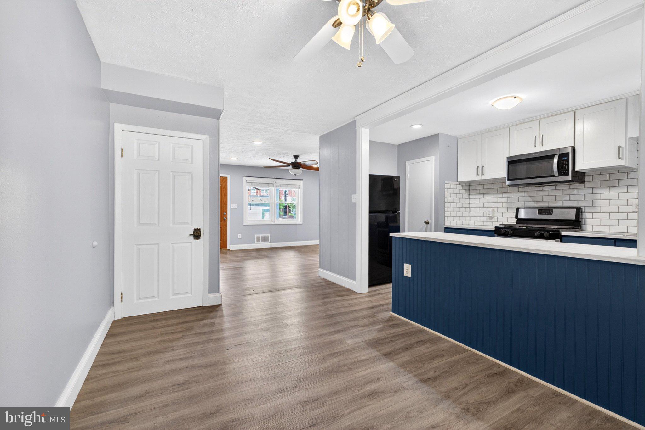7729 Charlesmont Road Baltimore, MD 21222 - Photo 10 of 38 Modern open-concept living space.