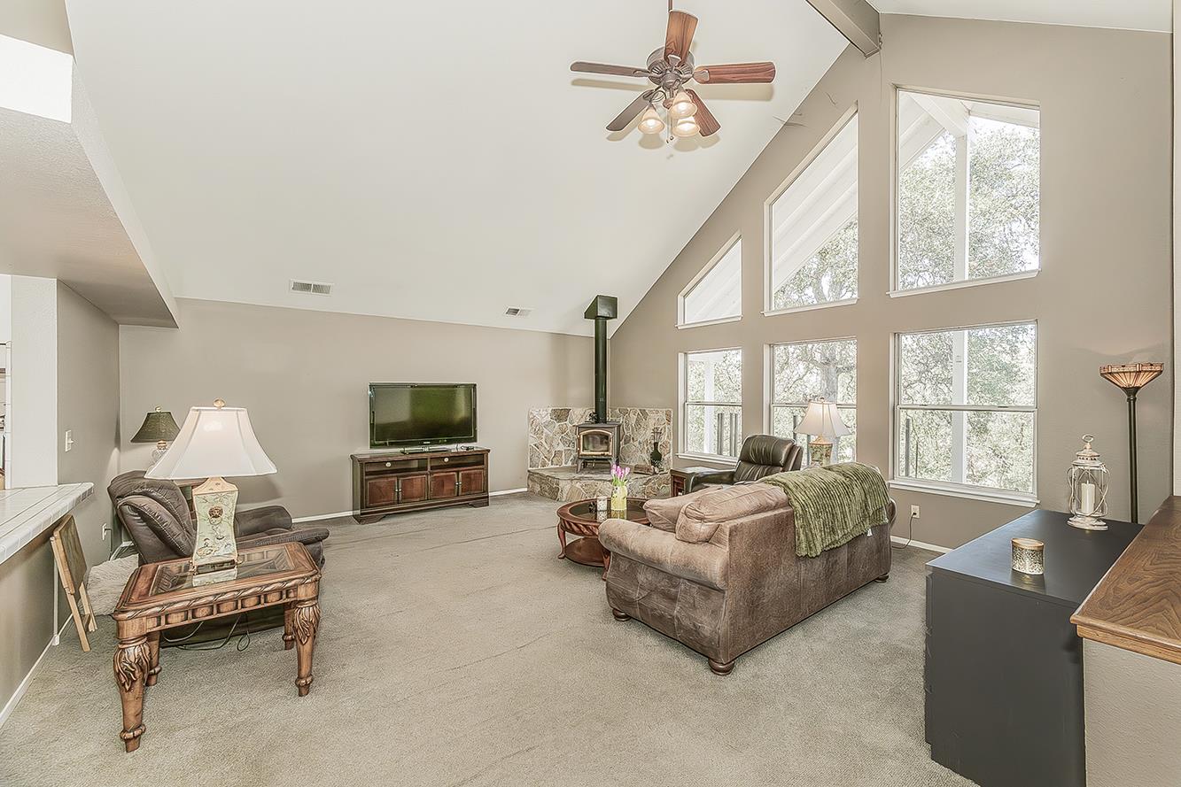 14815 Garlock Lane Prather, CA 93651 - Photo 9 of 80 a living room with furniture and a flat screen tv