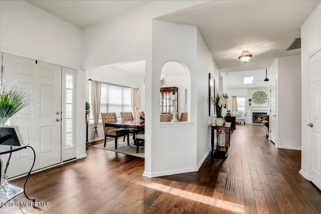 a view of a living room and dining room