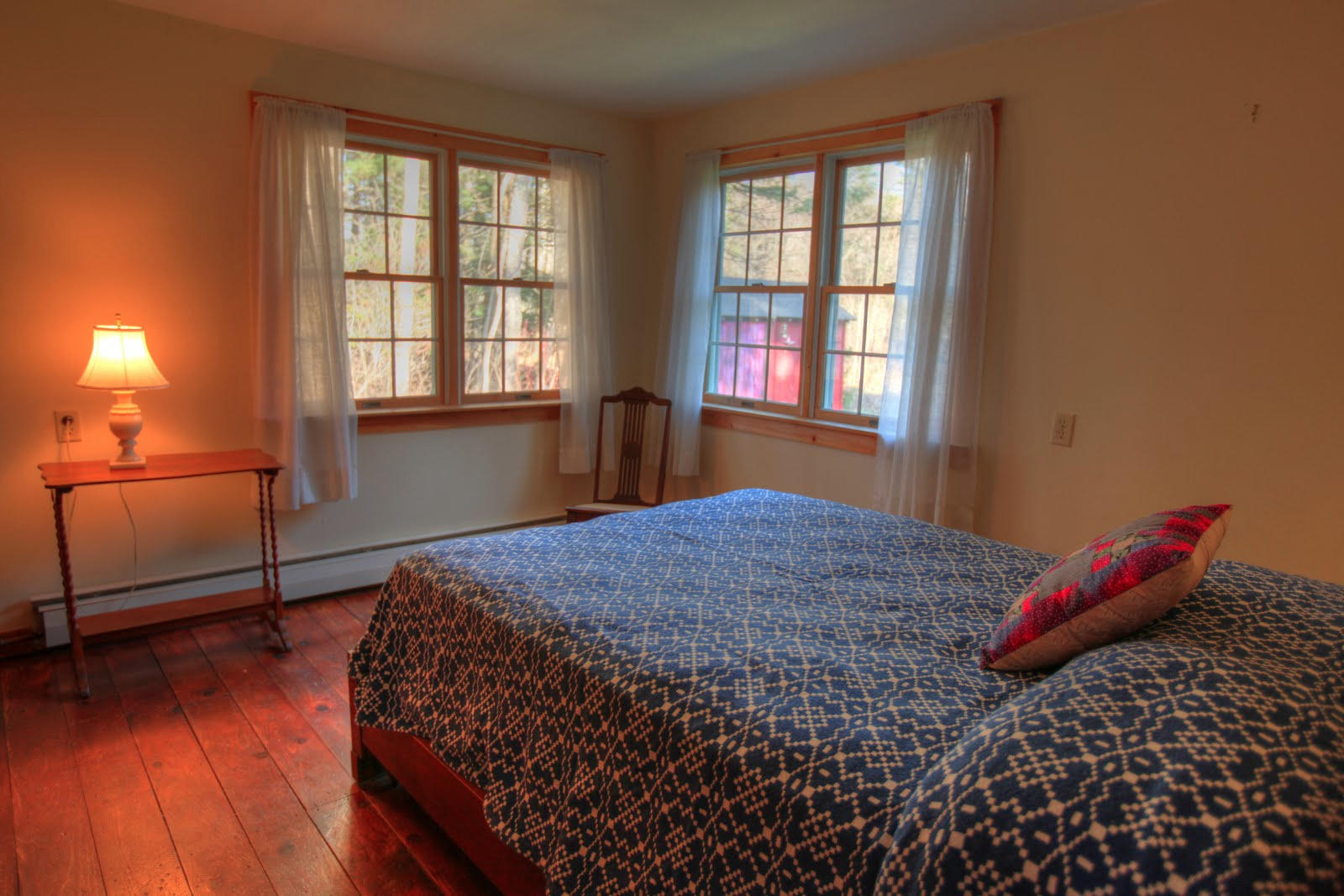 36 Blue Hill Road Monterey, MA 01245 - Photo 16 of 34 a bedroom with a bed and a window