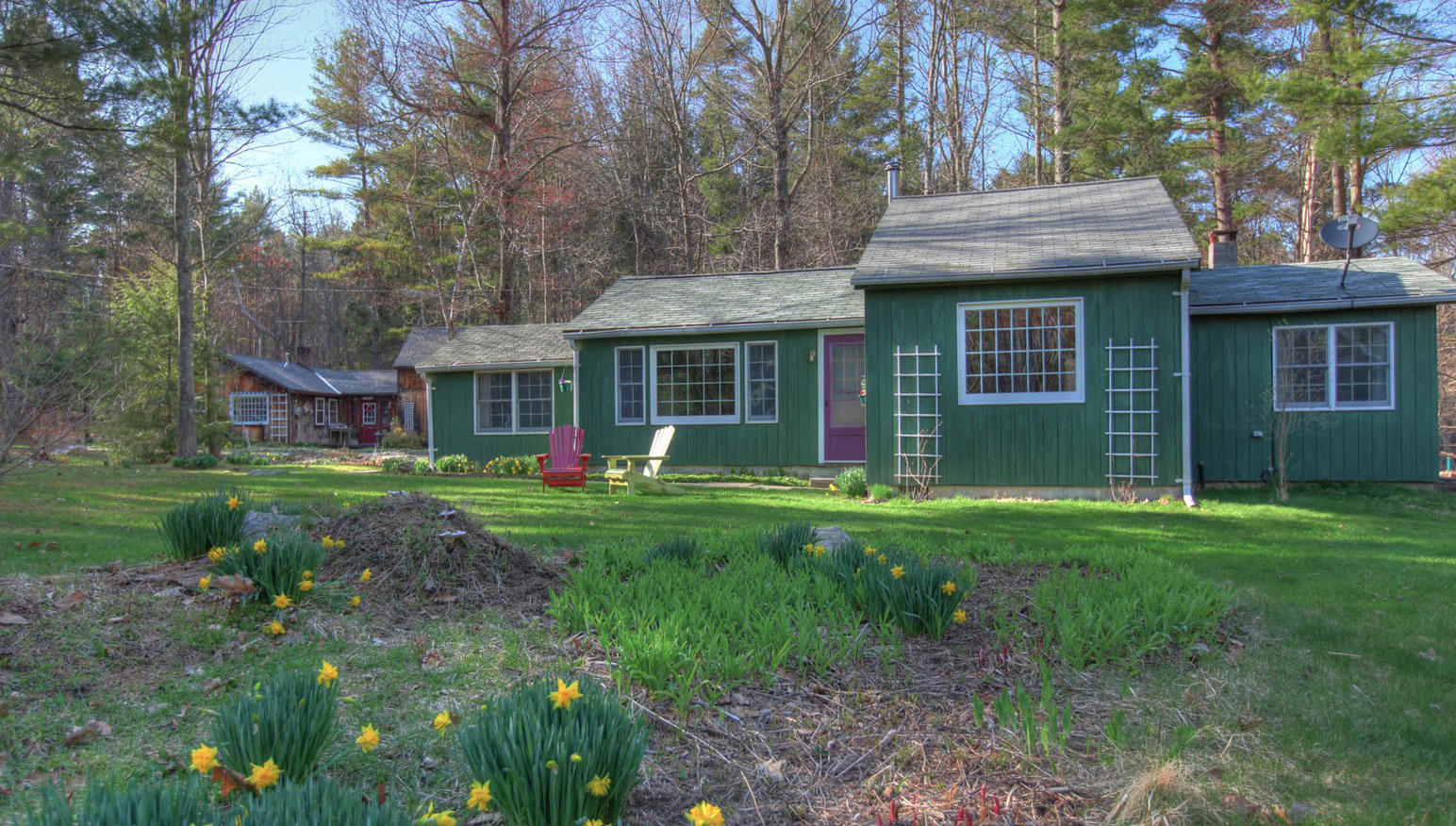 36 Blue Hill Road Monterey, MA 01245 - Photo 5 of 34 a view of a brick house with a yard potted plants and large tree