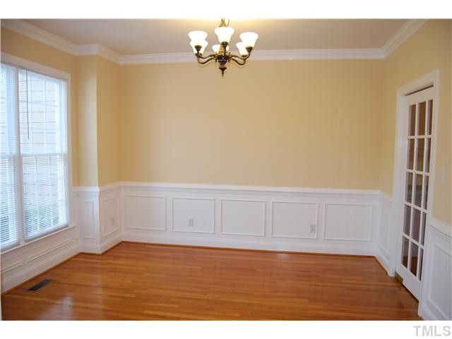 107 Nouveau Avenue Raleigh, NC 27615 - Photo 4 of 25 The formal dining room offers hardwood floors and lovely details!