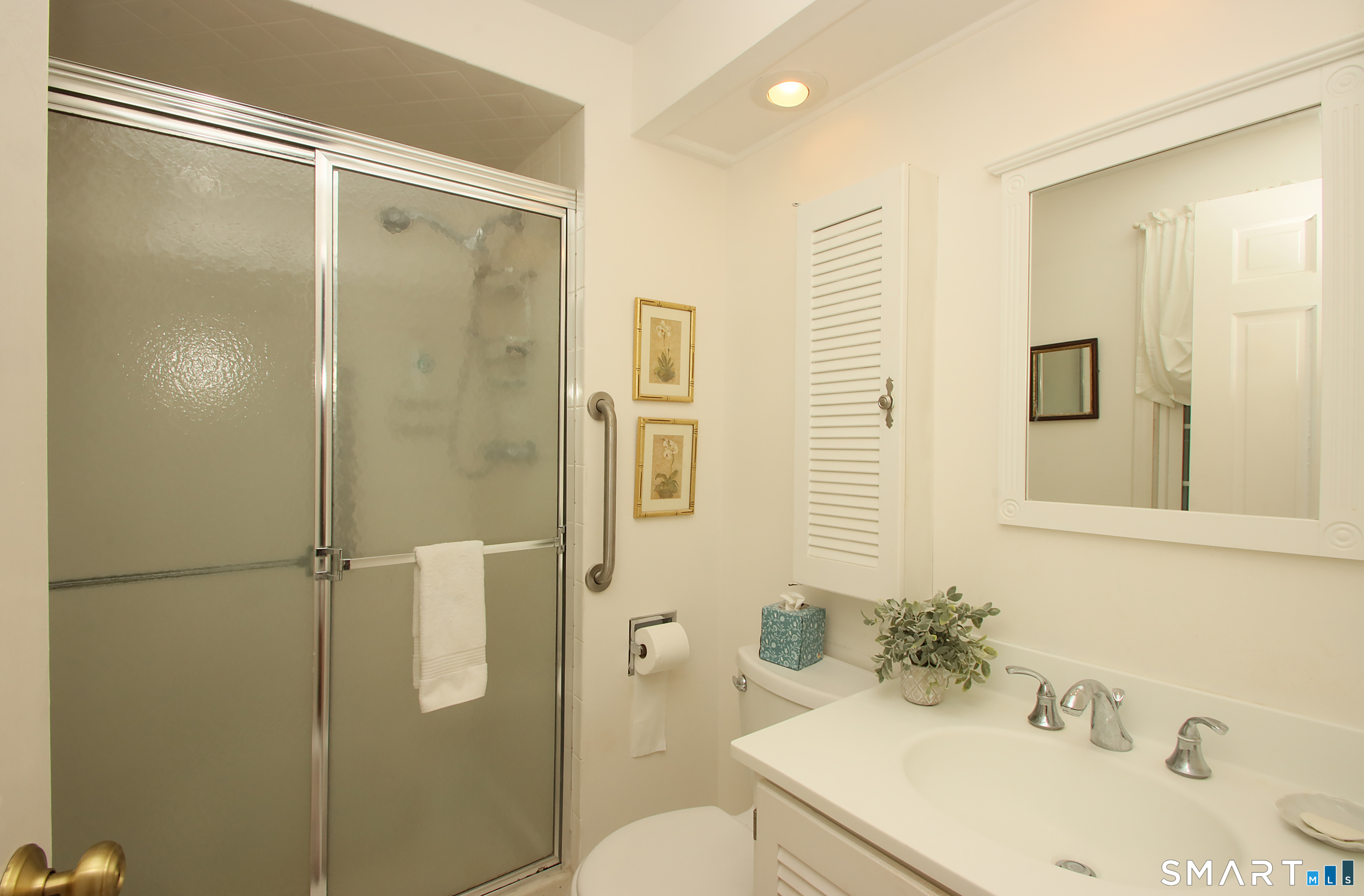 49 Hammonassett Meadows Road Madison, CT 06443 - Photo 24 of 31 Primary bathroom has a tiled walk-in shower