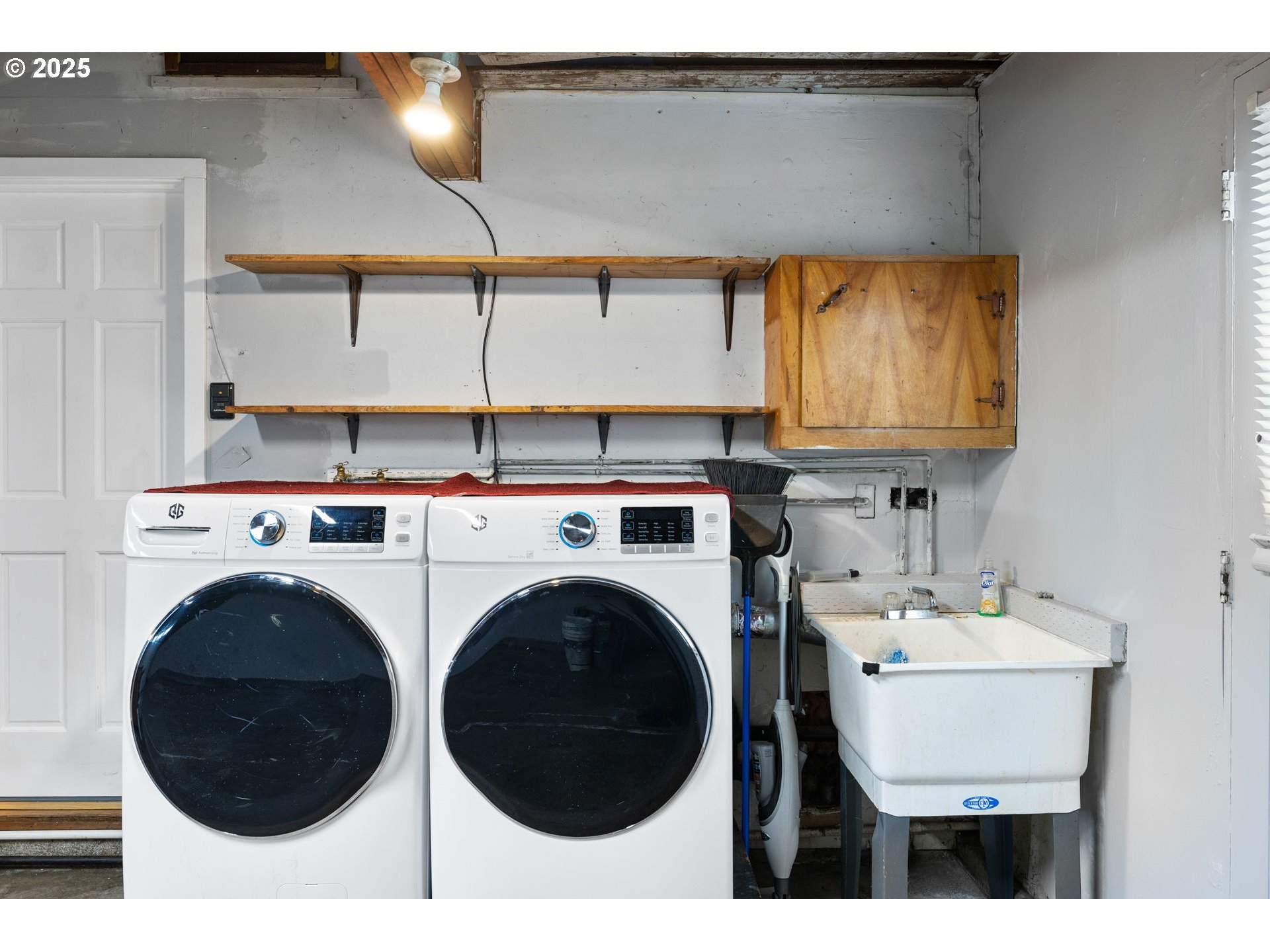 7402 Southwest Locust Street Portland, OR 97223 - Photo 20 of 25 a bathroom with a sink and a vanity