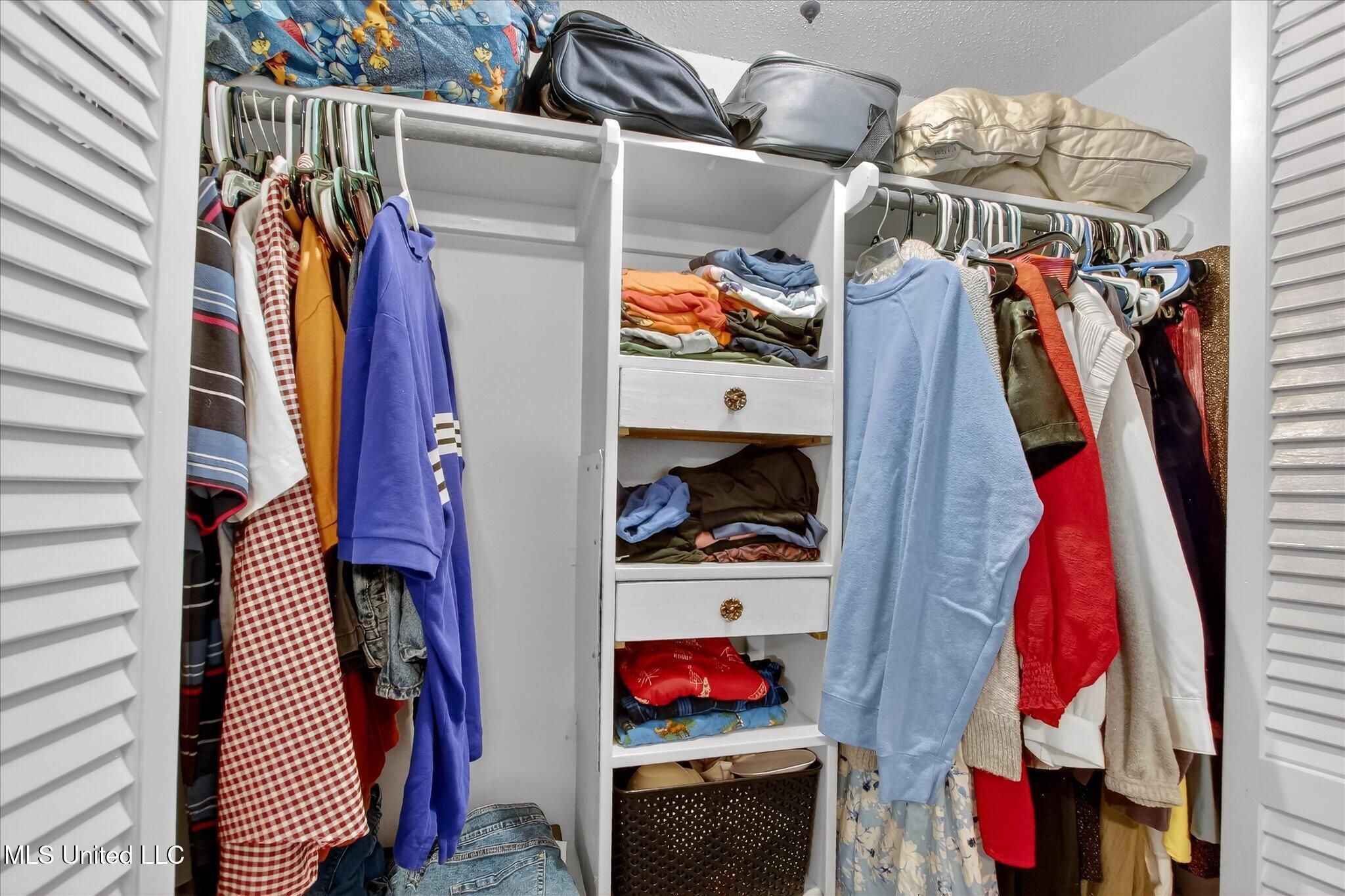 126 Molokai, Unit G Diamondhead, MS 39525 - Photo 18 of 30 Bedroom Closet w/built in