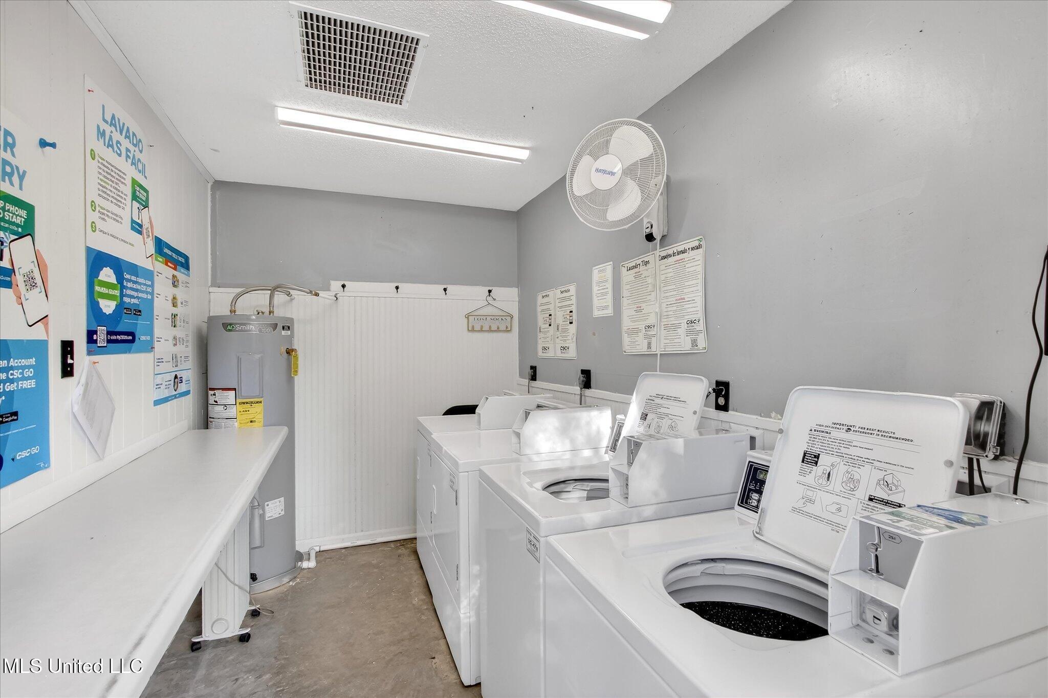 126 Molokai, Unit G Diamondhead, MS 39525 - Photo 25 of 30 Laundry Building