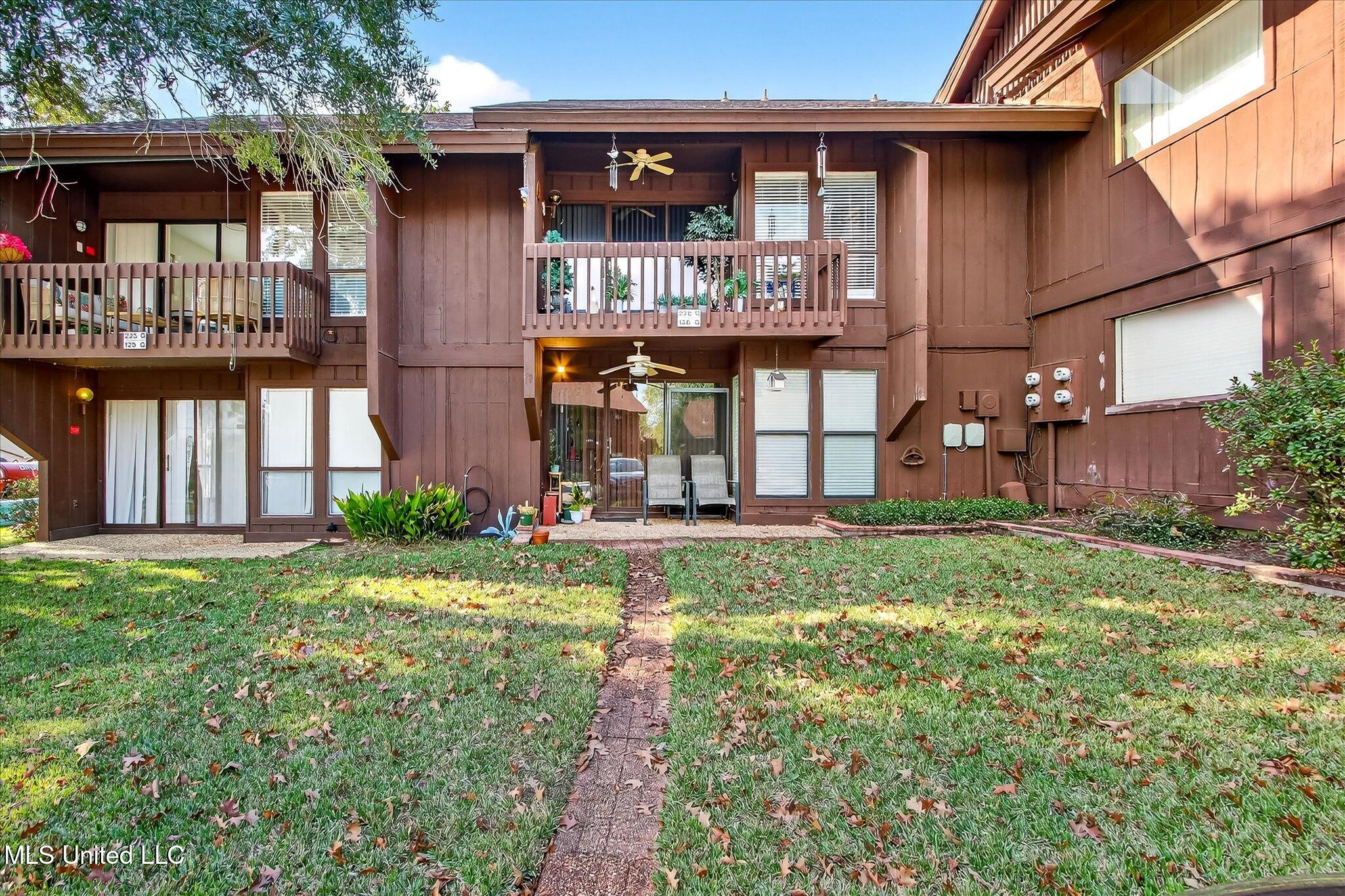 126 Molokai, Unit G Diamondhead, MS 39525 - Photo 26 of 30 Rear Porch