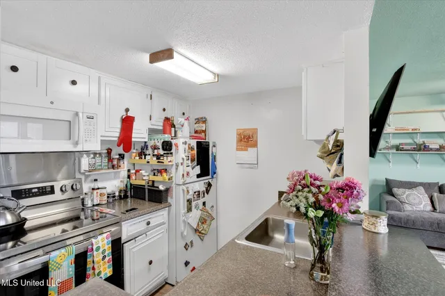 $115,000 | 126 Molokai, Unit G, Diamondhead, MS 39525