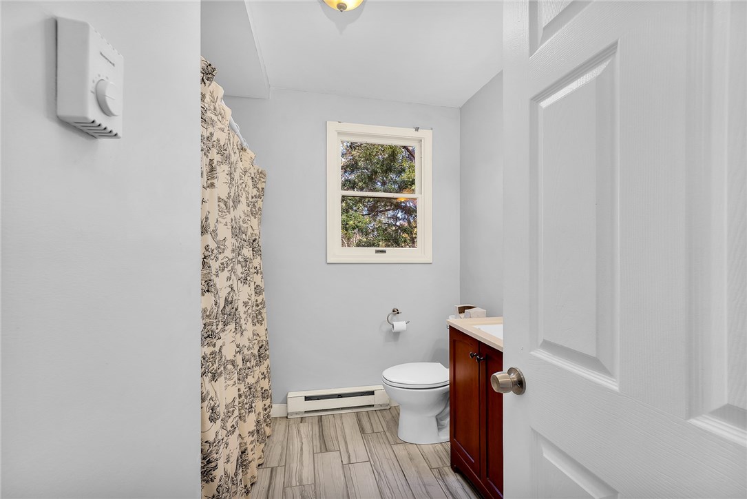 31 Skagerrak Road Charlestown, RI 02813 - Photo 16 of 22 First floor bath with tub and tiled floor