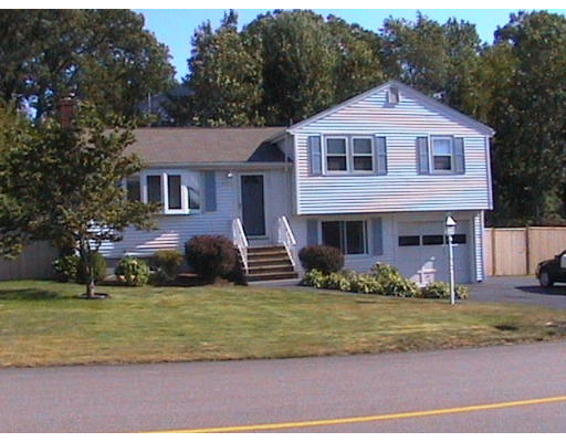 26 Redman Road Canton, MA 02021 - Photo 1 of 1 a front view of a house with a yard