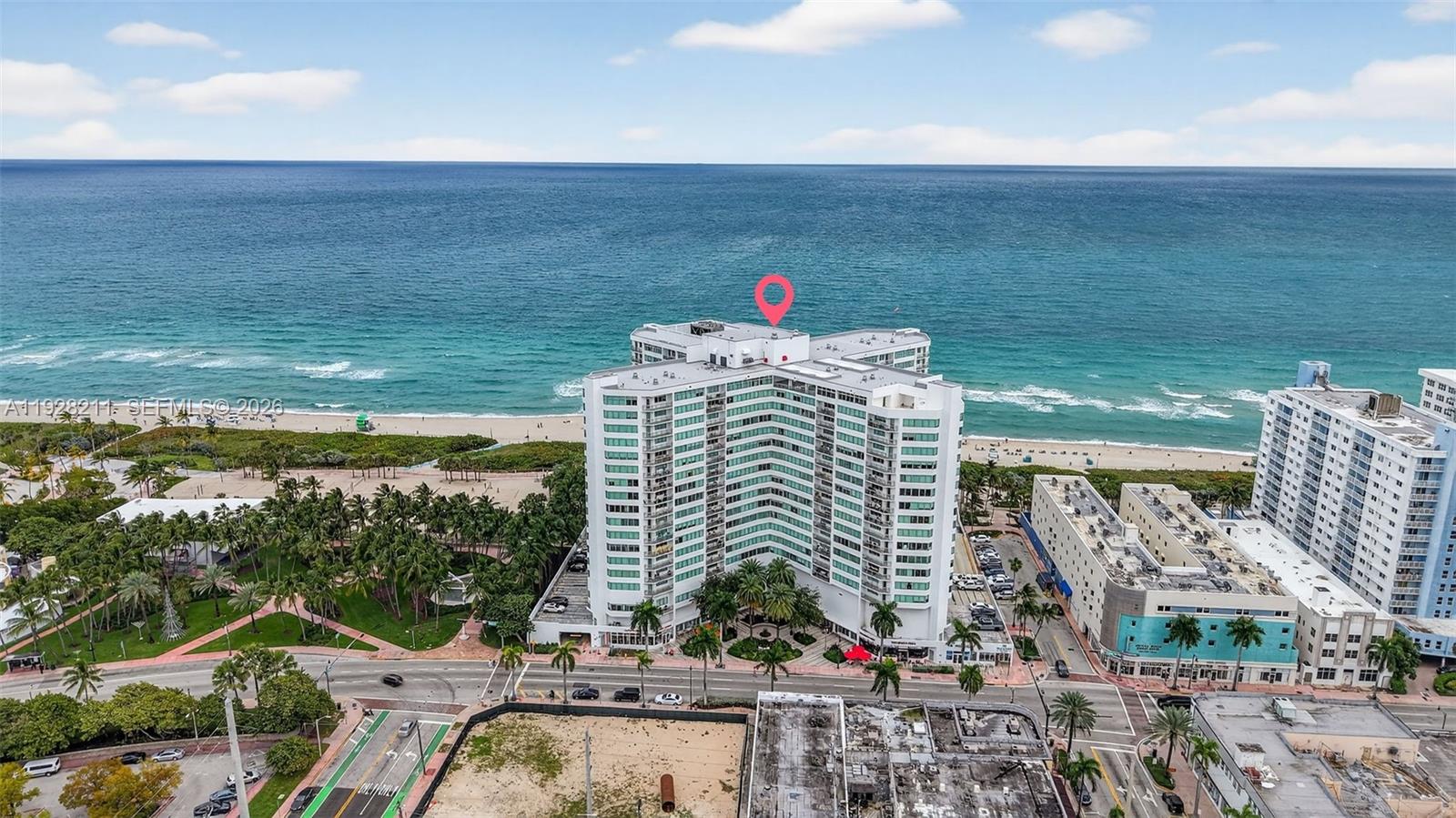 7135 Collins Avenue, Unit 1015 Miami Beach, FL 33141 - Photo 39 of 41 a large building with a view of lake