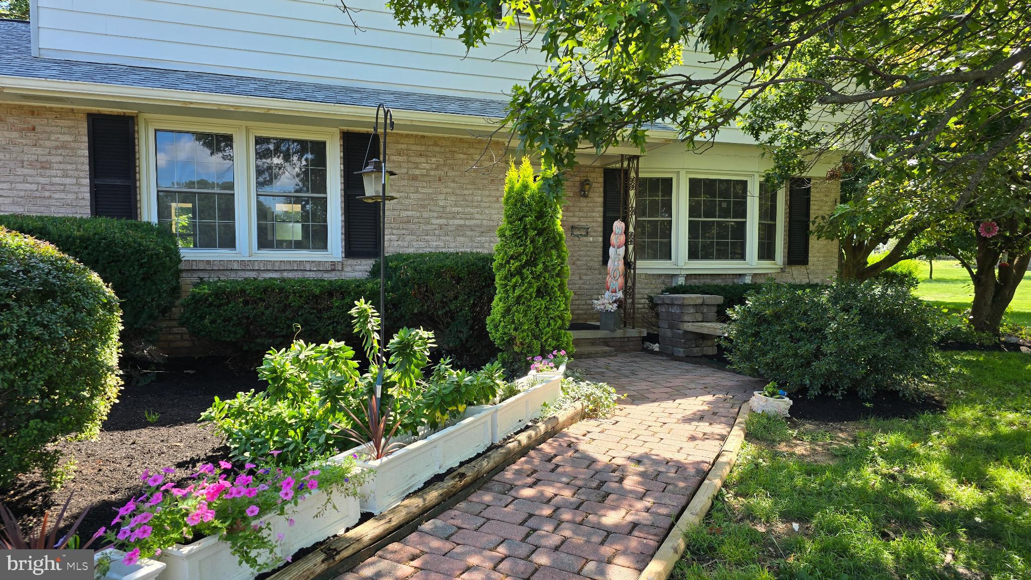 1734 Becker Road Manheim, PA 17545 - Photo 1 of 30 a front view of a house with a yard and fountain