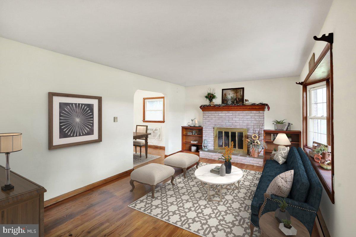 1734 Becker Road Manheim, PA 17545 - Photo 13 of 30 a living room with furniture and a fireplace