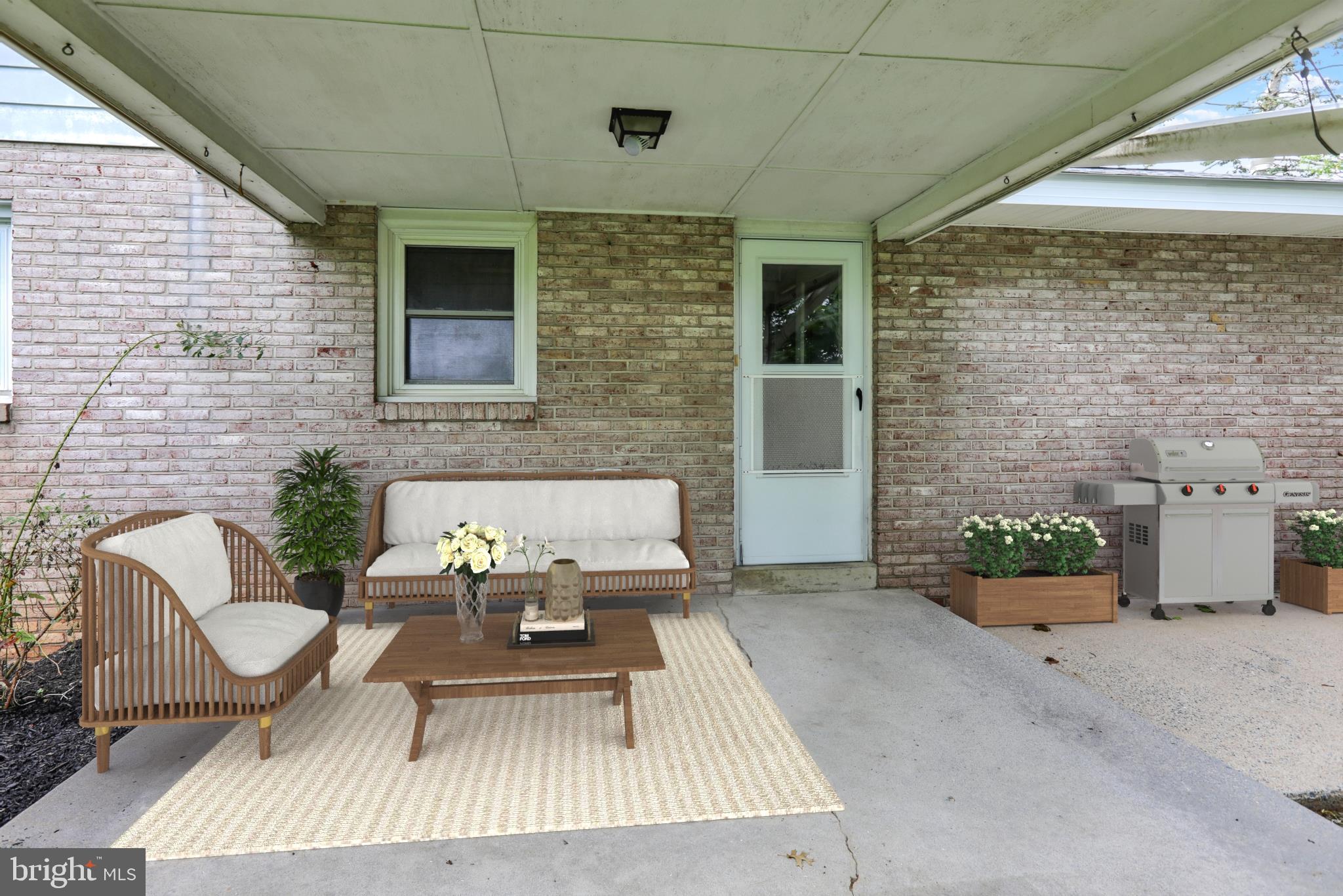 1734 Becker Road Manheim, PA 17545 - Photo 9 of 30 a outdoor living space with patio furniture and a fireplace