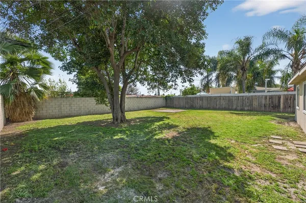 a view of swimming pool with a yard