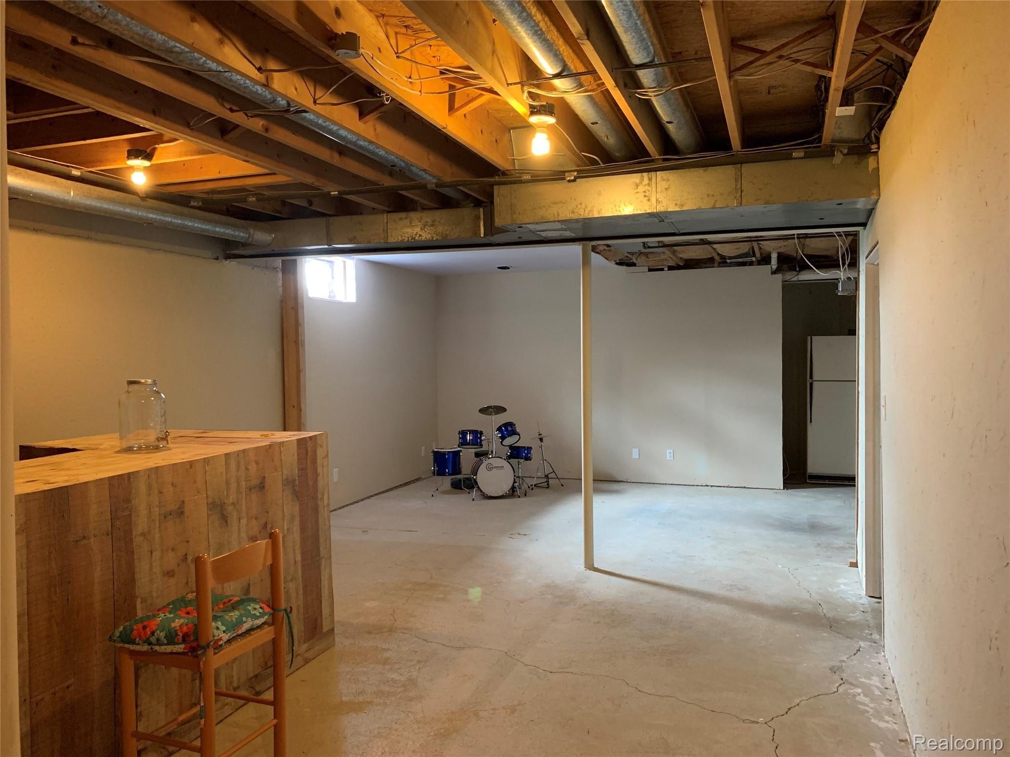 57260 12 Mile Road New Hudson, MI 48165 - Photo 21 of 22 basement 2.jpg
